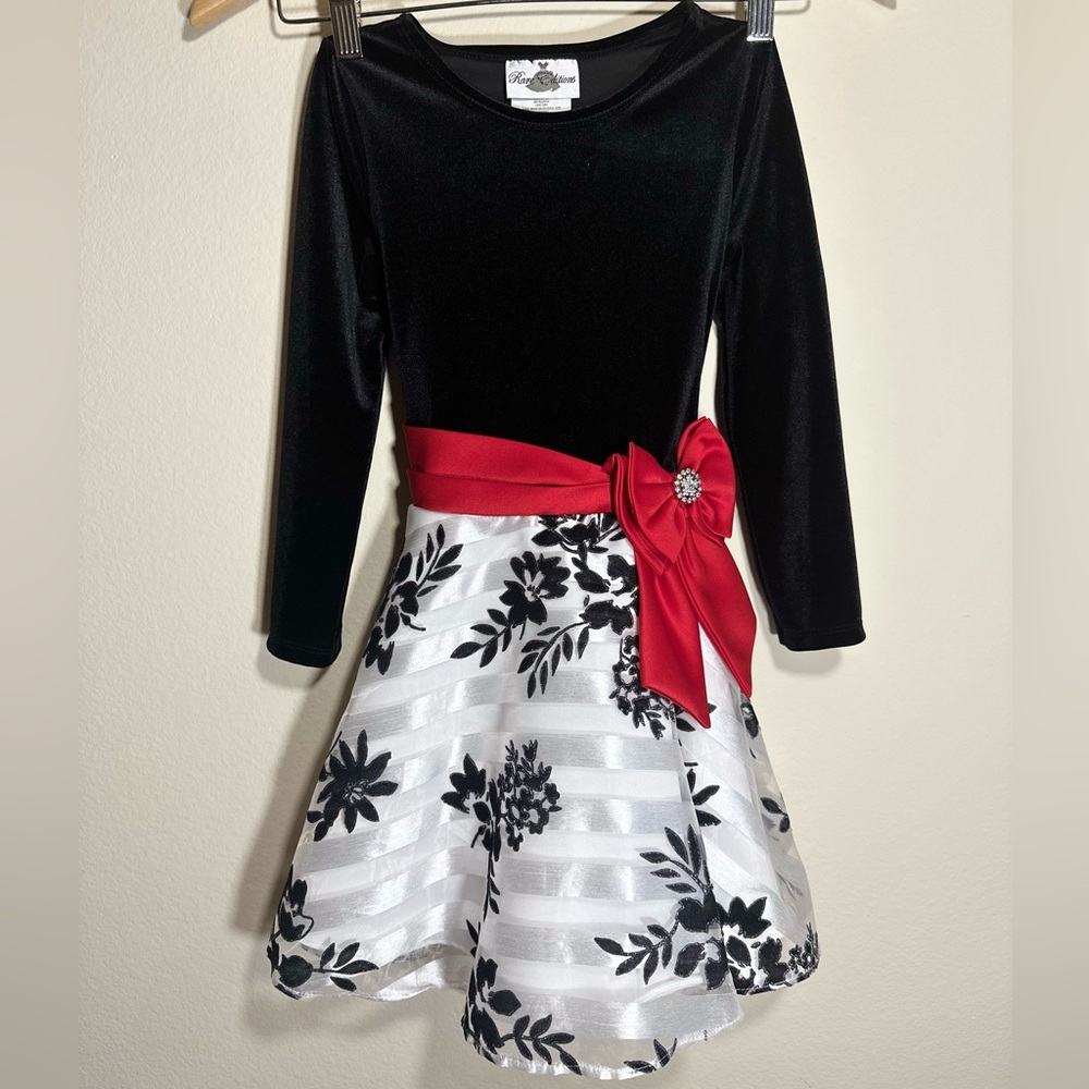 Rare Editions Dress Sizes:5 & 7. Black Velvet long-sleeve, White Flocked Skirt